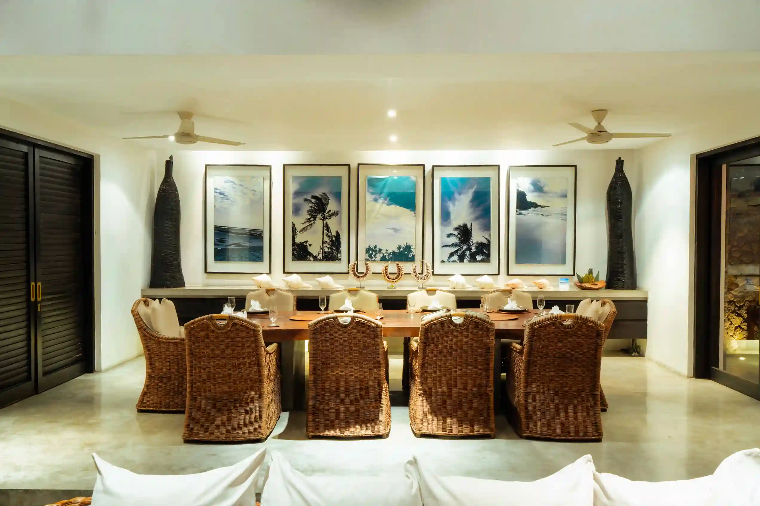 Dining room of a private villa in Canggu, Bali set for dinner